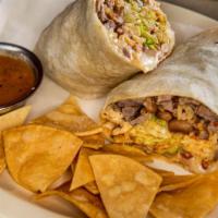 Steak Burrito · Mexican rice, pinto beans, lettuce, Monterrey jack cheese, sour cream, and our homemade sals...