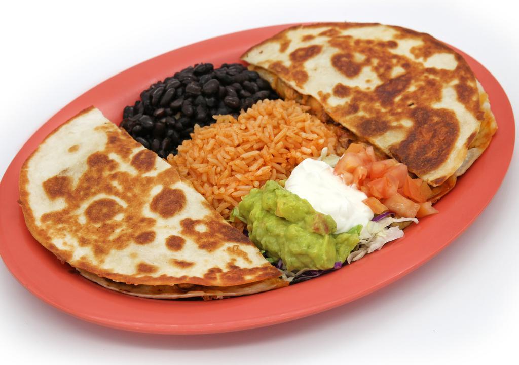 Nui Quesadilla · Choice of cheese, chicken adobo, shredded chicken, ground beef, kalua pork, al pastor pork, steak, fish or shrimp. Served with sour cream, tomatoes and guacamole.