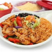 Fajitas · Choice of chicken adobo, steak or shrimp with bell peppers, onions and tortillas.