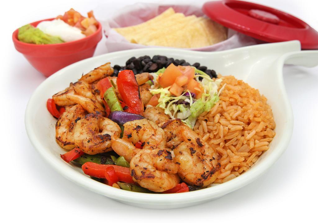 Fajitas · Choice of chicken adobo, steak or shrimp with bell peppers, onions and tortillas.