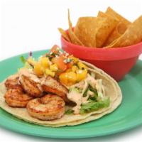Wikiwiki Shrimp Tacos · Grilled with aztec spices, topped with mango salsa, chipotle aioli and Cotija cheese.