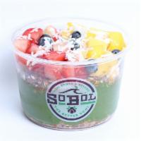 Green Bowl · We blend spinach, mango, bananas, kale, and almond milk to make a thick fruit smoothie. We t...