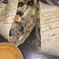 The Chicken Chipotle Wrap · Grilled Chicken, Brown Rice, Black Beans, Avocado and Chipotle Sauce.