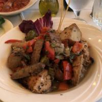 Chicken Scarpariello · Chicken on or off the bone with hot or sweet peppers with Italian sausage in a brown, balsam...