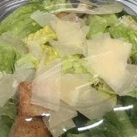 Caesar Salad  · Crispy romaine lettuce, with parmesan cheese, garlic croutons, tossed in creamy caesar dress...