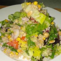 Garden Quinoa Salad · White quinoa, red onions, chickpeas, almonds, corn, cucumber, tomatoes, kalamata olives, wit...