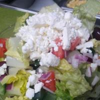 Greek Salad  · Romaine lettuce, tomatoes, red onion, cucumber, imported feta cheese, kalamata olives, with ...