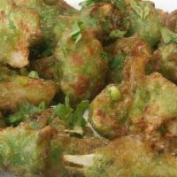 Gobi Malligai · Crispy cauliflower marinated with mint and cilantro.