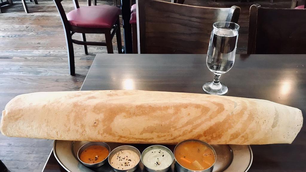 Masala Dosa · Dosa filled with mild spiced and mashed potatoes.