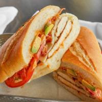 The Uptown · Grilled chicken, swiss cheese, bacon, avocado, tomatoes and chipotle mayo.