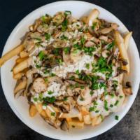 Poutine Fries · Fries topped with gravy, mozzarella, mushrooms, and chives