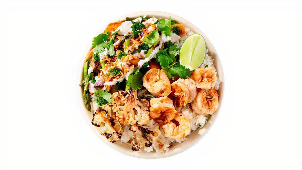Coconut Tiger Shrimp Rice Bowls · Coconut Tiger Shrimp with grilled seasonal vegetables, chili yogurt and chive lime vinaigrette.