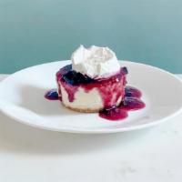 Berry Cheesecake · A delicious New York Style cheesecake served with a mixed berry compote topped with a mascar...