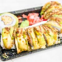 Kawasaki Roll · Spicy kani, cucumber, crunch, wrapped with avocado topped with sweet sauce and added crunch.