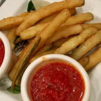 Zucchini Sticks · Served with tomato sauce.