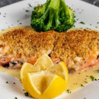 Entrée Shrimp Oreganata · Seven pieces. Fresh jumbo shrimp topped with our homemade seasoned breadcrumbs, broiled in w...
