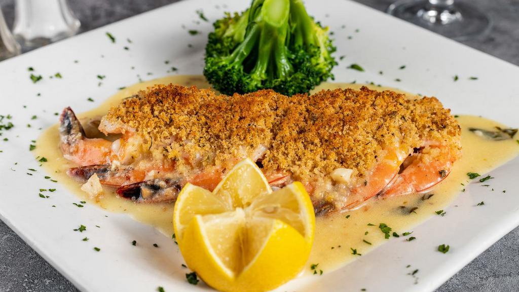 Entrée Shrimp Oreganata · Seven pieces. Fresh jumbo shrimp topped with our homemade seasoned breadcrumbs, broiled in white wine and garlic scampi sauce.