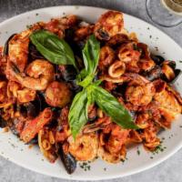 Entrée Sautéed Seafood · Shrimp, mussels, clams, calamari, and scallops Sautéed in mild marinara, spicy Fra Diavolo s...
