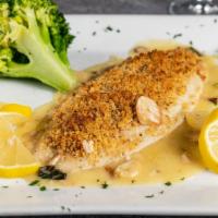 Entrée Tilapia Oreganata · Fresh tilapia topped with our homemade seasoned breadcrumbs, broiled in a white wine a garli...
