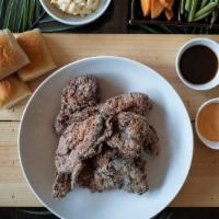 Mochiko Fried Chicken · whole chicken - 12pc
mochiko flour-battered fried chicken served with assorted pickles, Hawa...