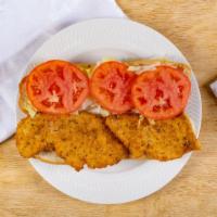 Chicken Cutlet · With tomato sauce.