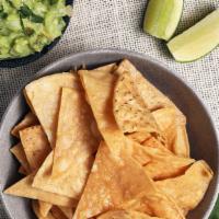 Chips ＆ Salsa · Freshly made corn tortilla chips w/ avocado tomatillo salsa