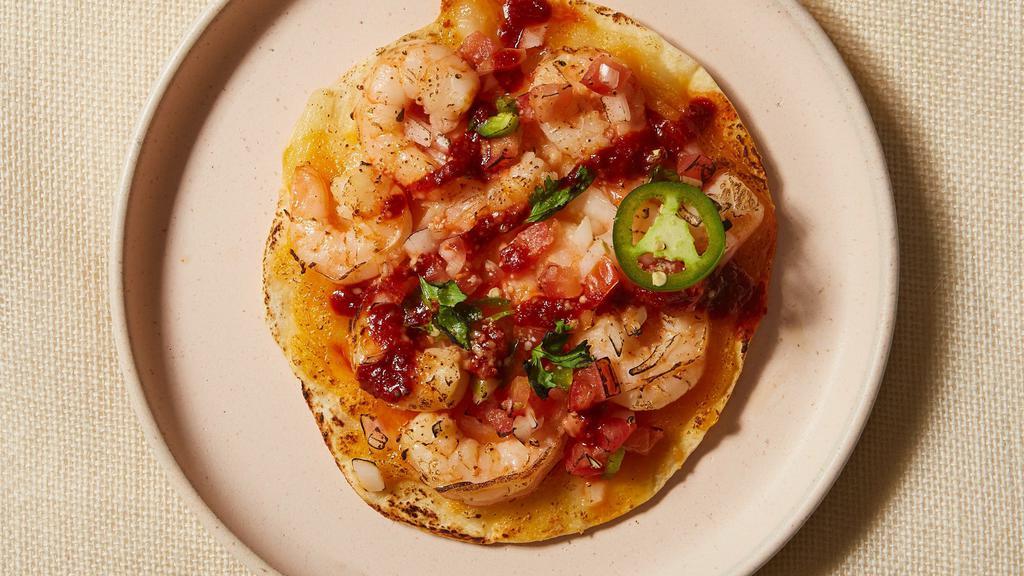 Chile Shrimp Quesadilla · Fragrant garlic shrimp, melted oaxaca cheese and topped with our slightly spicy dried Chile salsa, cilantro and onion.