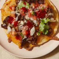 Al Pastor Quesadilla · Thinly sliced al pastor berkshire pork, melted oaxacan cheese and topped with your choice of...