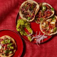 Taco Bar For 12 · 4 tacos per person with your choice of proteins. Served with onion, cilantro, pico de gallo ...