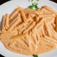 Penne Vodka Sauce Dinner · Served with salad and bread.
