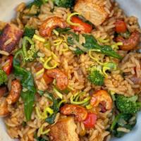 Veggie Fried Rice · Tofu, broccoli, peppers, leeks, spinach, tamari, spiced cashew