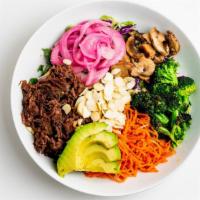 Svk Paleo Bowl (Beef) · 18 hour beef, power greens, avocado, broccoli, roasted shrooms, pickled carrots, sliced almo...