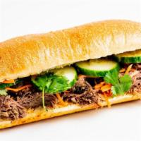 Banh Mi Sandwich · Build your own! A crisp baguette with your choice of filling, sauce, and toppings served wit...