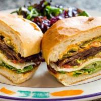Torta De Milanese · Tortas are traditional Mexican sandwiches on a homemade roll. Thinly pounded steak, lettuce,...
