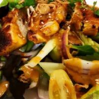 Thai Chicken Salad · Sliced Pan-seared chicken or tofu Tomatoes, red onion, cucumber fresh spring mixed served wi...