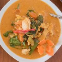 Red Curry · Hot and spicy. Your choice of protein sautéed with mushrooms, bamboo shoots, chili peppers, ...