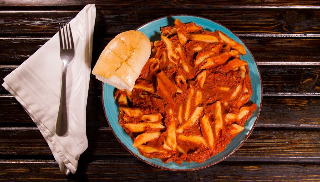 Penne Veggie Supreme · Penne pasta, artichoke hearts, sweet peppers and mushrooms sauteed in pasta sauce and sprinkled with mozzarella cheese. Comes with a side salad and homemade bread with butter.
