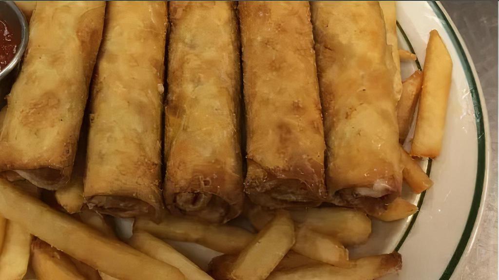 Pizza Logs · Five pizza logs with fries and pizza sauce.