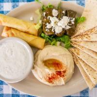 Falafel Platter · Served with hummus and tahini. Served with a cup of soup, tossed salad or Greek salad and yo...