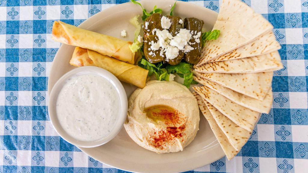 Falafel Platter · Served with hummus and tahini. Served with a cup of soup, tossed salad or Greek salad and your choice of a side.