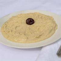 Hummus · Humus. Chickpeas mashed to paste with lemon juice and garlic flavored.