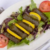 Stuffed Grape Leaves · Yalanci dolma. Grape leaves delicately flavored with rice and herbs.