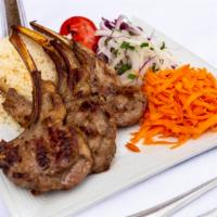 Lamb Chops · Pirzola. Grilled baby lamb chops. Served with rice and vegetables.