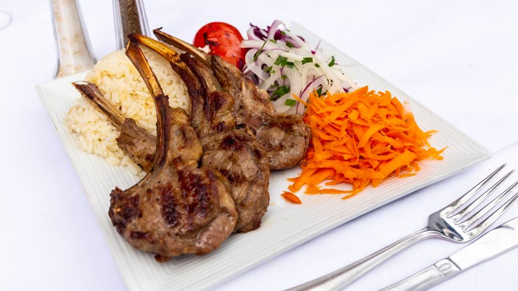 Lamb Chops · Pirzola. Grilled baby lamb chops. Served with rice and vegetables.