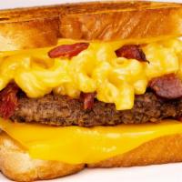 Bacon Mac & Cheese Burger Melt · Always Fresh Never Frozen Beef with Creamy Mac & Cheese and chopped bacon in between our fam...