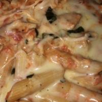 Penne Vodka · Our classic creamy pink sauce with fresh mozzarella and Parmesan cheese.