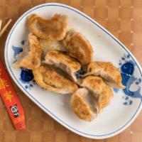 Fried Dumpling (8) · Dumplings are filled with ground pork with our homemade recipe.