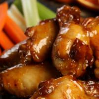 Spicy Orange Wings · Hot heat 8 pieces spicy orange wings. Comes with classic style bone-in or boneless wings, ca...