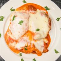 Chicken Parm Dinner · Served with pasta and bread.