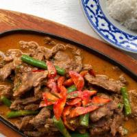 “Home Style” Beef Panang · House made mild curry sauce, coconut cream, string bean, kaffir lime leave & chili Serve wit...